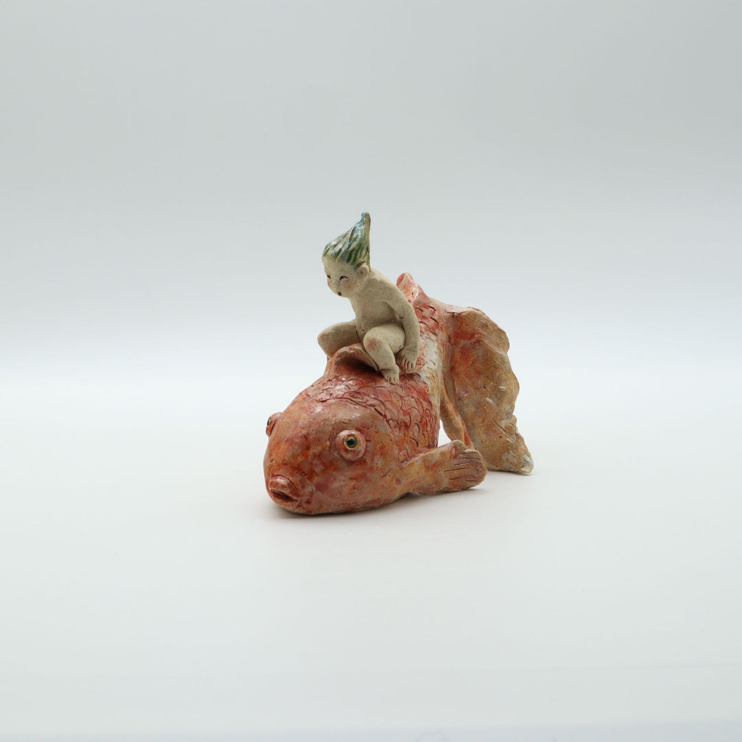 金魚にのる